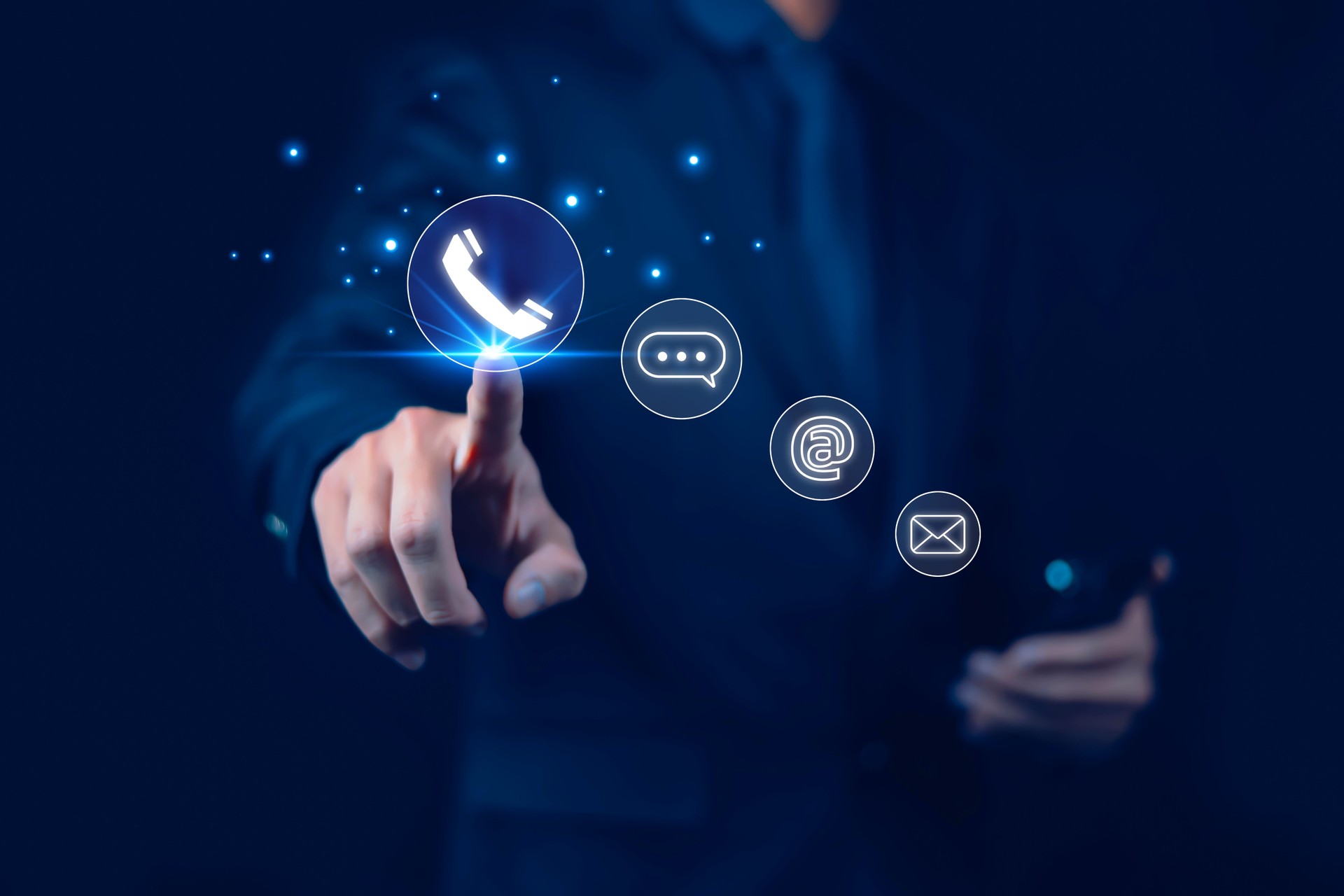 Businessman using phone to contact customer support, showing contact icons (address, phone, email, mobile, call).
